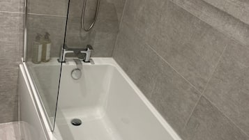 Hair dryer, towels, soap, shampoo