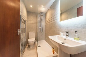 Hair dryer, towels, soap, shampoo