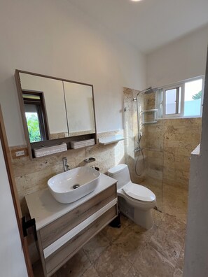 Shower, hair dryer, towels, soap