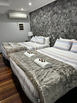 1 室のベッドルーム、アイロン / アイロン台、WiFi (無料)、ベッドシーツ