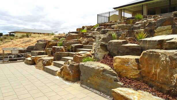 A stone staircase leading up to a building with a metal railing. - Marina Belle, Wallaroo (Wallaroo)