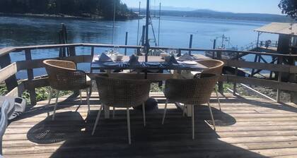 Unique and peaceful beach access getaway on Quadra Island. Outstanding view