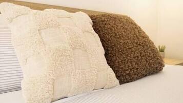 4 habitaciones, tabla de planchar con plancha, cuna de viaje y wifi