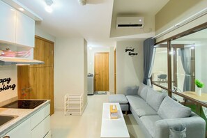 Apartment | Living area - Homey and Nice 1BR at LRT City Jatibening Apartment (Bekasi)