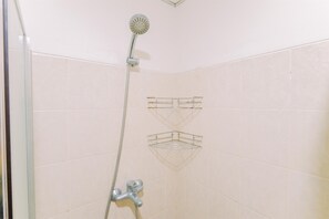 Studio | Bathroom | Shower, towels - Homey And Big Studio Apartment At The Wave Kuningan (Jakarta)