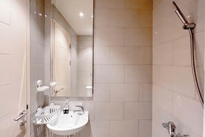 Studio | Bathroom | Shower, towels - Simple And Relaxing Studio At Supermall Mansion Benson Apartment (Surabaya)