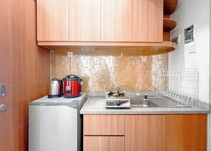 Estúdio | Cozinha privada | Geladeira, cooktop, panela elétrica de arroz