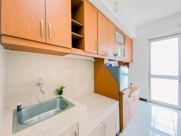 Estúdio | Cozinha privada | Frigobar, cooktop, panela elétrica de arroz