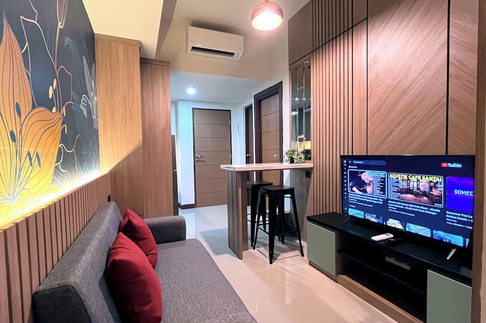 Warm And Homey 2Br At Vida View Makassar Apartment