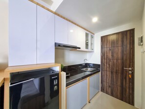 Estúdio | Cozinha privada | Geladeira, cooktop, panela elétrica de arroz