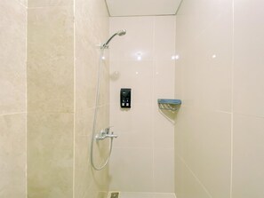 Studio | Bathroom | Shower, towels - Cozy Studio Apartment At Transpark Cibubur (Depok)
