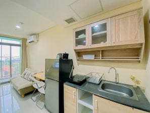 Apartment | Private kitchen | Fridge, stovetop, rice cooker, dining tables - Good Place And Homey 1Br Apartment At Pejaten Park Residence (Jakarta)