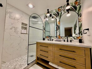 Shower, hair dryer, towels, soap