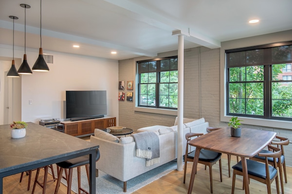 Deluxe Suite, 1 King Bed | Living area | LCD TV, Netflix, streaming services, music library