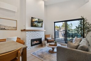 TV, fireplace - Azure Shores at The Beach House (Black Creek)