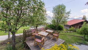 Outdoor dining - Apartment 'La Charbonnière 2' with Mountain View, Private Terrace and Wi-Fi (Cordon)