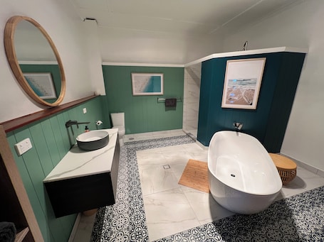 Hair dryer, towels, soap, shampoo. Comforting Stay with Spacious & Serene Bath