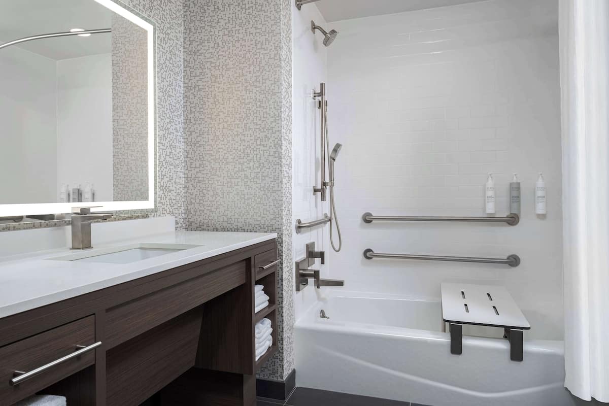Studio Suite, 1 King Bed, Accessible, Bathtub | Bathroom shower