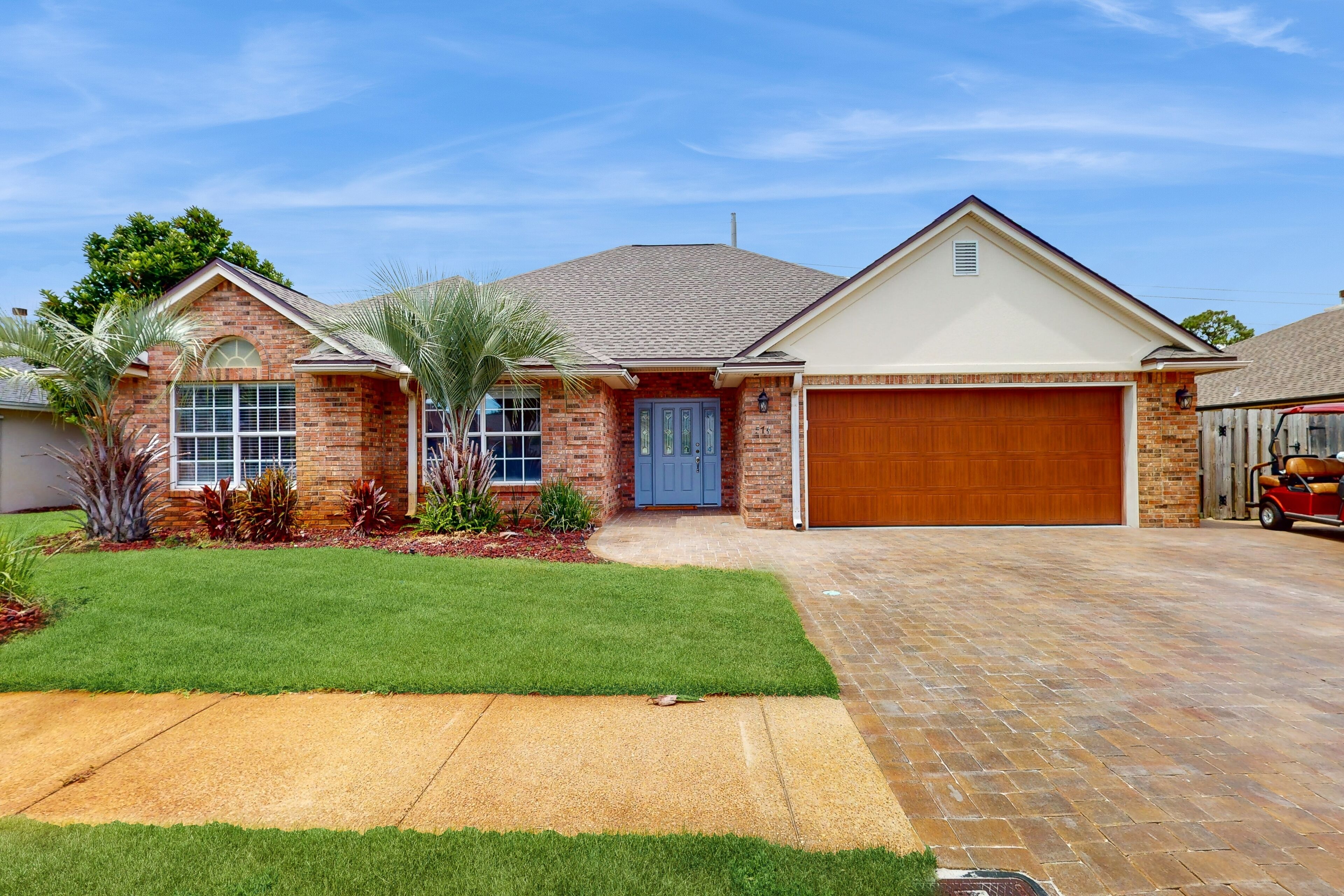 Gorgeous coastal home with golf cart and easy beach access