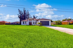 Exterior - Dog-friendly coastal home w/ private pool, WiFi, W/D, & bikes (Cape Coral)