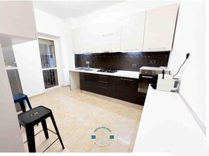 Private kitchen - Orione Ostia Holiday Apartment (ROMA)