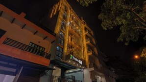 A building with a sign reading "treebo Dim Shree Baharas" at the entrance. - Treebo Om Shree Banaras (Varanasi)
