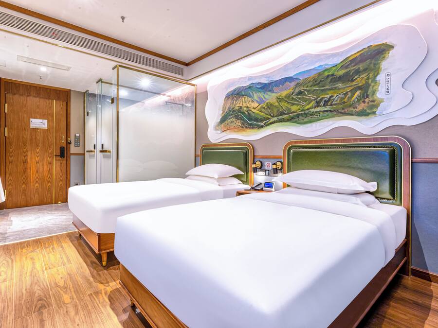 Premium bedding, memory-foam beds, free minibar, individually decorated