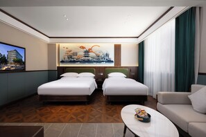 Habitació triple familiar | Minibar gratuït, habitacions insonoritzades i wifi gratuïta 