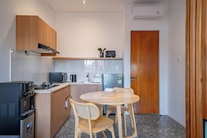 Standard Apartment, Patio | Living area | 32-inch LED TV with digital channels, Netflix, streaming services
