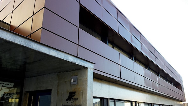 A modern building with a flat facade, large windows, and a concrete base. - jeune france accueil et formation  (Cholet)