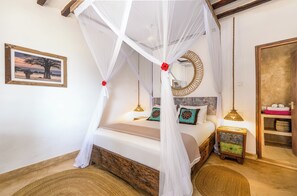 Iron/ironing board, bed sheets - Poa Poa Bungalows (Kiwengwa)