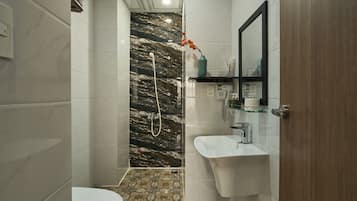 Family Room, 2 Queen Beds, Non Smoking, City View | Bathroom | Hair dryer, slippers, soap, shampoo