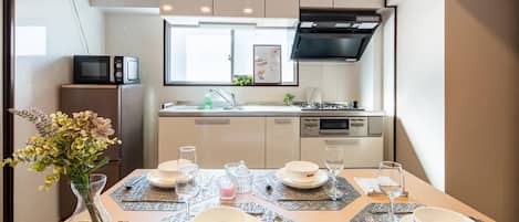 Appartement familial | Aire de séjour | Téléviseur à écran plat