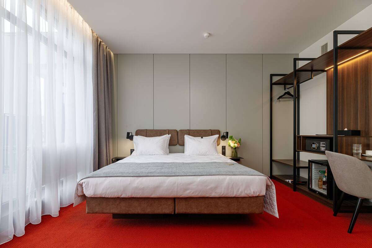 1 quarto, roupas de cama premium, edredons de pluma, frigobar