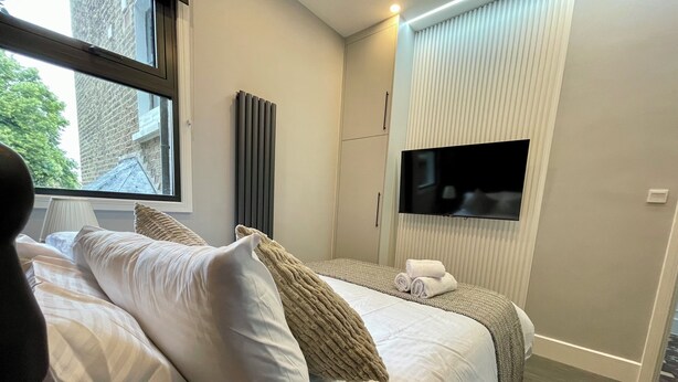 1 slaapkamer, een strijkplank/strijkijzer, gratis wifi, beddengoed