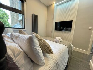 1 slaapkamer, een strijkplank/strijkijzer, gratis wifi, beddengoed