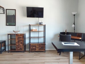 Deluxe Single Room, Non Smoking, Kitchen (7) | Living area - triple a Apartments in Altfeld (Marktheidenfeld)