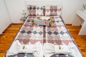 2 bedrooms, desk, iron/ironing board, travel cot