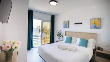 2 bedrooms, blackout curtains, soundproofing, iron/ironing board