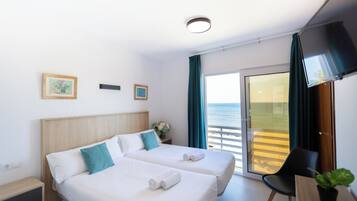 2 bedrooms, blackout curtains, soundproofing, iron/ironing board