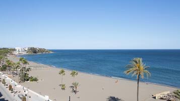 On the beach, beach towels