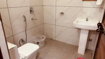 Shower, rainfall showerhead, towels, soap