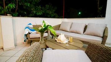 Apartment (Three Bedroom Apartment with Terrace) | Living room | 32-inch flat-screen TV with digital channels