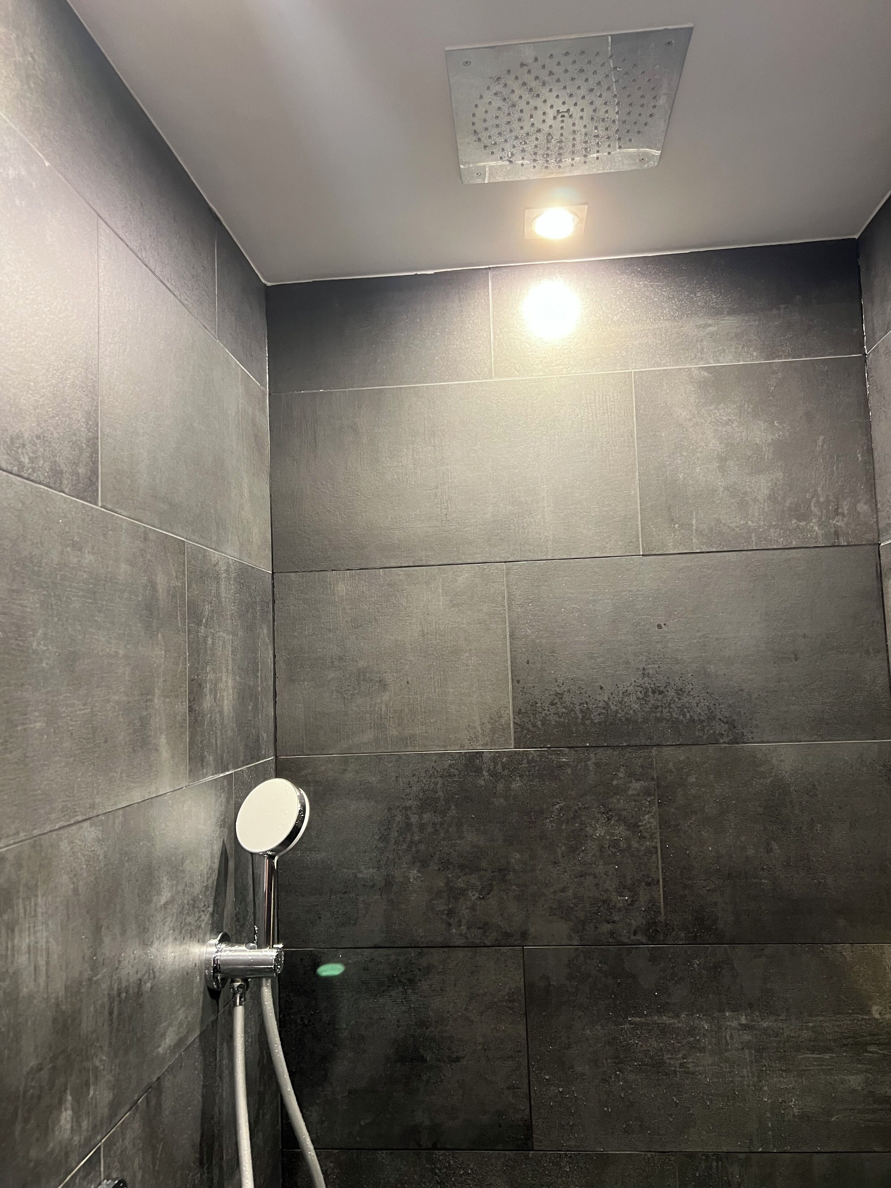 Shower, towels, soap, toilet paper