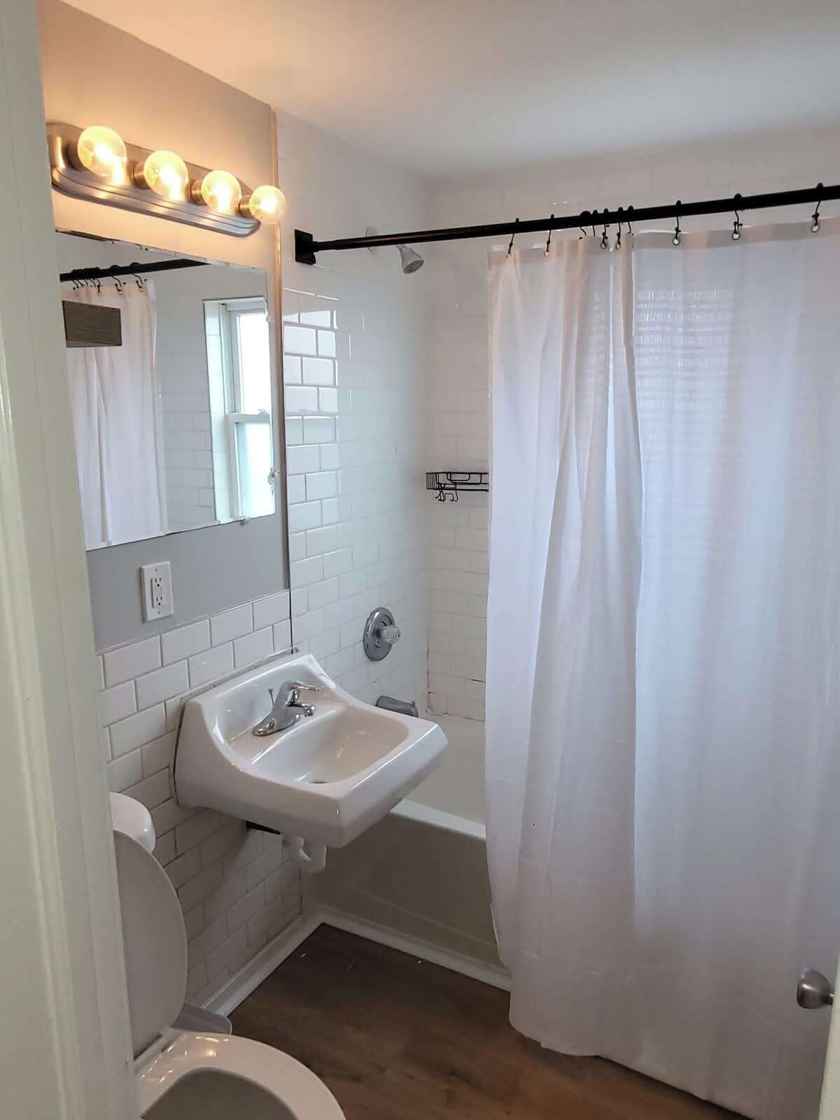 Shower, hair dryer, towels, shampoo