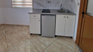Τρίκλινο Δωμάτιο, Μπαλκόνι