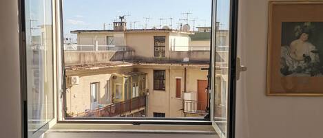 2 chambres, fer et planche à repasser, Wi-Fi, draps fournis