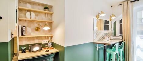 A modern bathroom with a vanity, shelves, and a mirror.