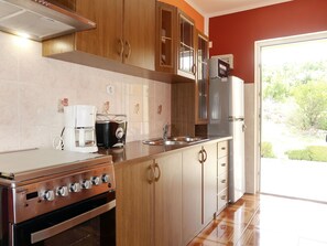 Fridge, microwave, oven, cookware/dishes/utensils