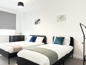 Apartamento | 2 quartos, Wi-Fi de cortesia, roupa de cama